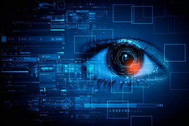 Digital composite of Eye scanning a futuristic interface